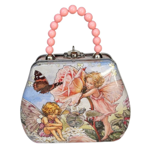 Flower fairy tin handbag featuring artwork by Cicely Mary Barker. Perfect for children to play. This bag features the Rose fairy and has a beaded pink handle